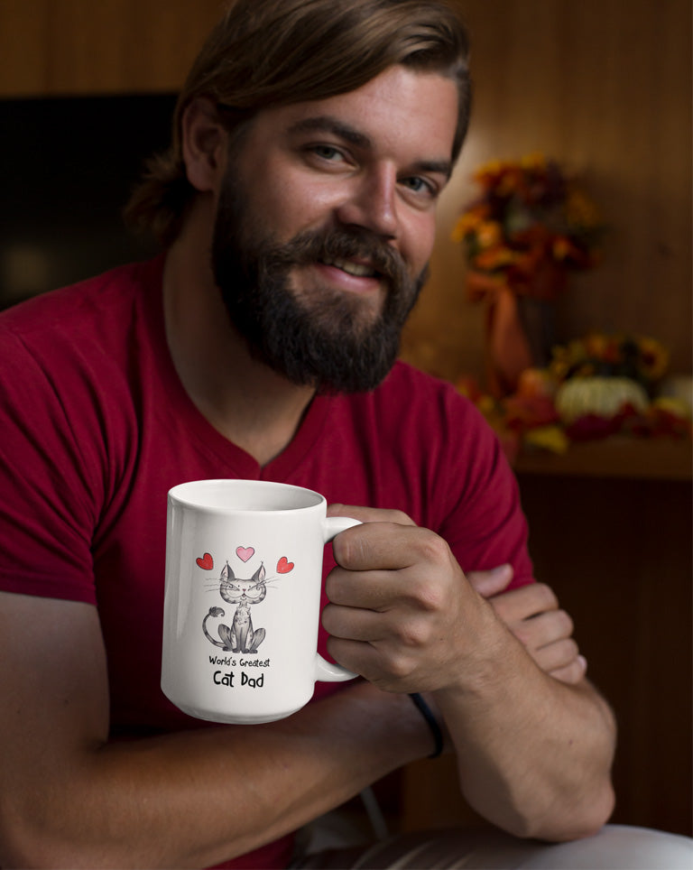 USA Matisse the cat world’s greatest cat dad 15oz jumbo mug held by a young man.