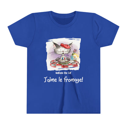 True blue official, Matisse the Cat children’s t-shirt with the slogan ‘Jaime le fromage ‘ showcases Matisse sitting at a French bistro table preparing to eat cheese.