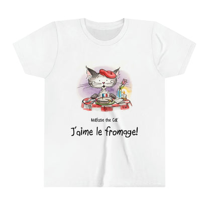 A white official, Matisse the Cat children’s t-shirt with the slogan ‘Jaime le fromage ‘ showcases Matisse sitting at a French bistro table preparing to eat cheese.